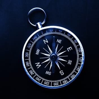 macro of old compass with blank copyspace for text message