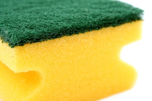 Sponge for washing utensils, on a white background 