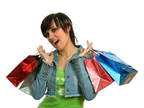 The happy girl with purchases, on a white background 