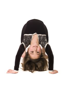 Young girl doing gymnastics isolated on white background