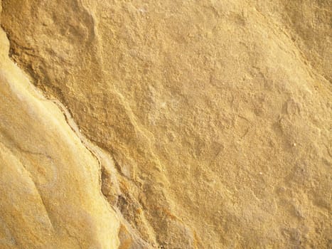 Gold rock texture shot close-up which can be use as background