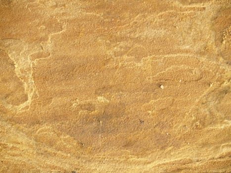 Gold rock texture shot close-up which can be use as background.