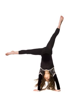 Young girl doing gymnastics isolated on white background