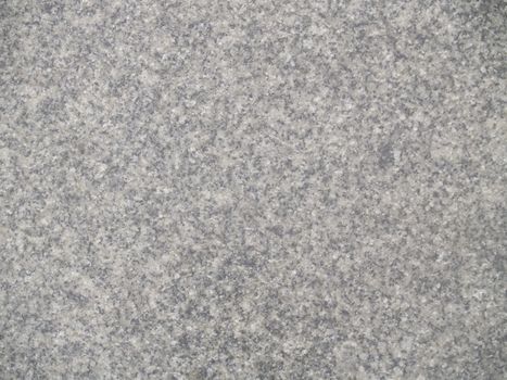 Grey granite shot close-up which can be use as background.