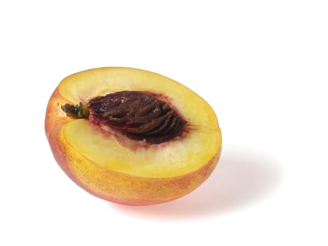 Half of tasty juicy peaches on a white background with clipping mask. Shadows is not included in clipping mask