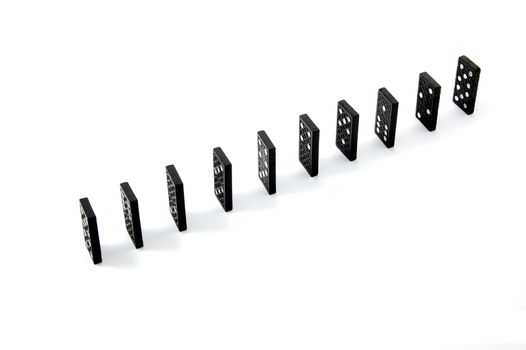 chain of dominoes isolated on a white background