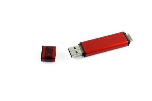Red usb flash memory isolated on white background.