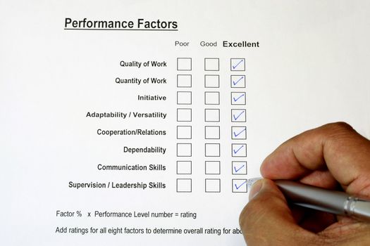 Overall Performance Rating with hand and pen