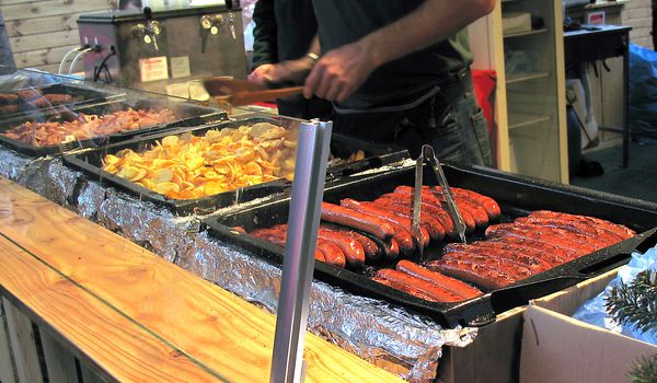 Outdoor caterer preparing comfort food