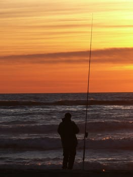 fishermen fishing in the sunset