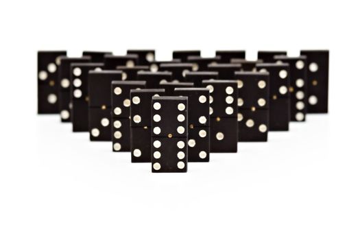 Domino pyramid on white background