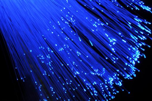 blue fiber optic on from computer network