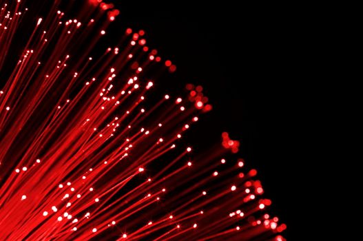 abstract information technology background with fiber optics