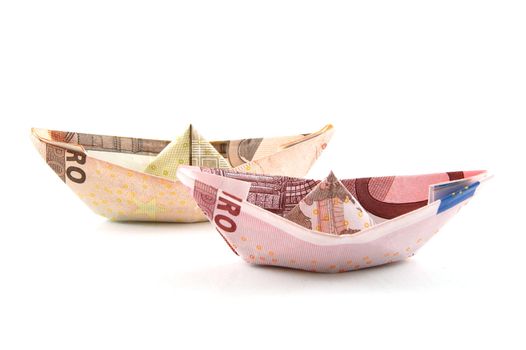 Ship made of money isolated on a white background.