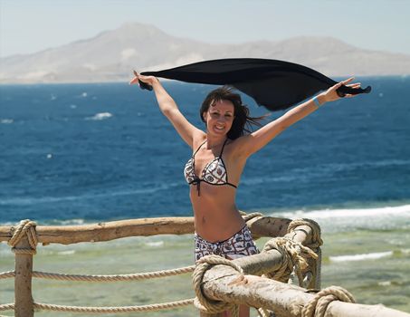 woman enjoying the sun on vacation