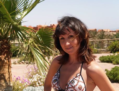 woman enjoying the sun on vacation