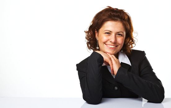 Image of a happy business woman smiling against white background