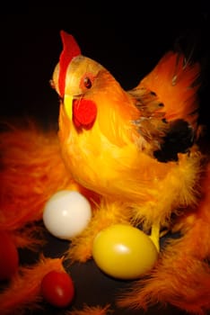 Hen and eggs in easter decorations.