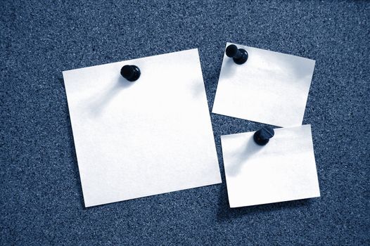 blank and empty sheet paper with pin on bulletin board
