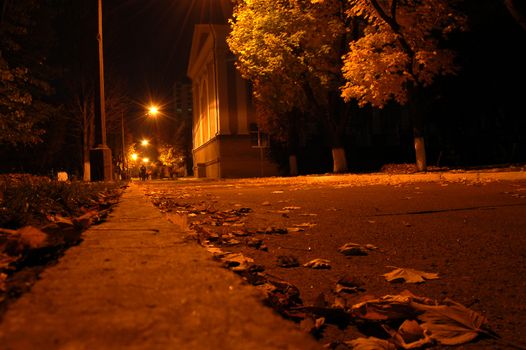 One warm autumn night at light of city lanterns