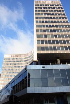 Nice modern glass and steel building on blue sky background