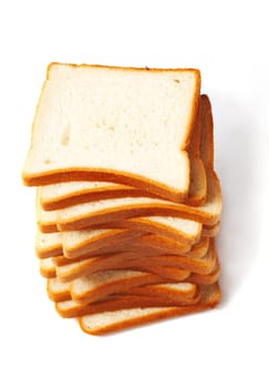 Sliced white bread for toasts on white background.