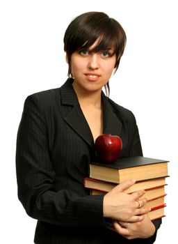 The young girl with books and a red apple, isolated on white