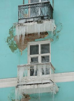  Frozen a window and balconies of the old house