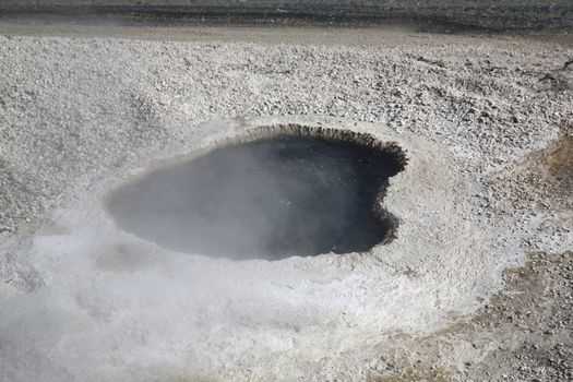 Steamy, boiling water in West Thumb Geyser Basin