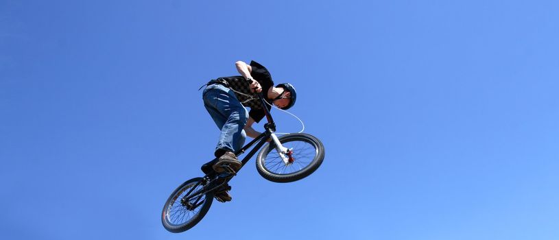 biker acrobat during jumping