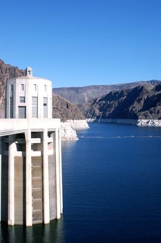 View of Lake Mead from the bridge across the Hoover Damn, between Nevada and Arizona time zones - blue water and blue sky