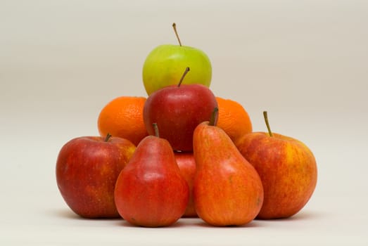 still life with mandarin,pear and apple