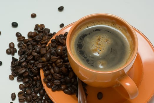 still life with mug with coffee and coffee beans