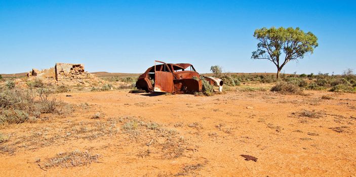 excellent image of an old car in the desert