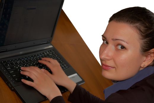 portrait of beautiful brunette women working on laptop (notebook)