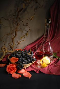 Red wine, grapes and lemon