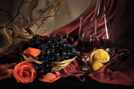 Red wine, grapes and lemon