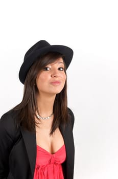 Pretty young woman posing in a studio with a nice black clothes