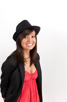 Pretty young woman posing in a studio with a nice black clothes