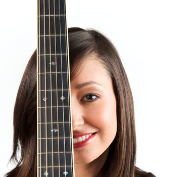 Pretty woman playing with guitar