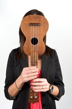 Pretty woman playing with guitar