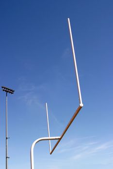 American football goal with the sky as a background.