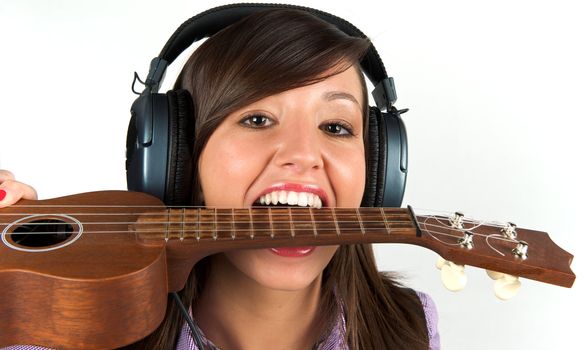 Pretty woman playing with guitar