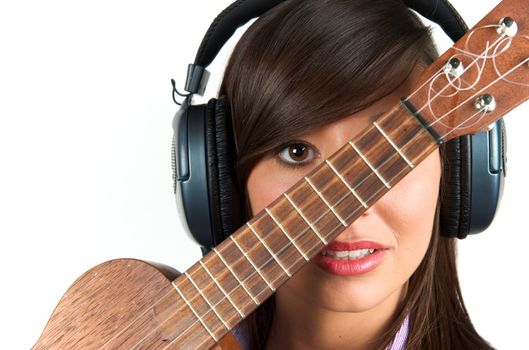 Pretty woman playing with guitar