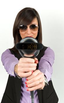 Young attractive woman with hairdryer 