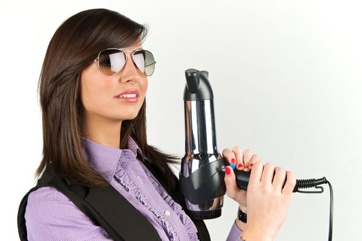 Young attractive woman with hairdryer 