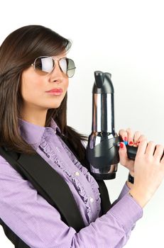 Young attractive woman with hairdryer 