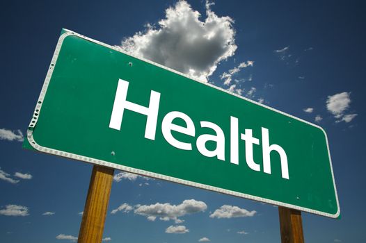 Health Road Sign with dramatic clouds and sky.