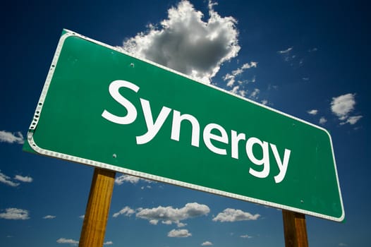 Synergy Road Sign with dramatic clouds and sky.