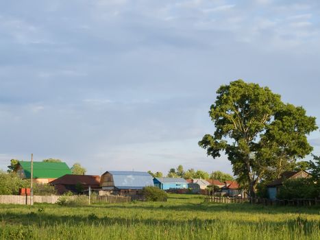 Sunrise from rural lahdscape. Summer in village